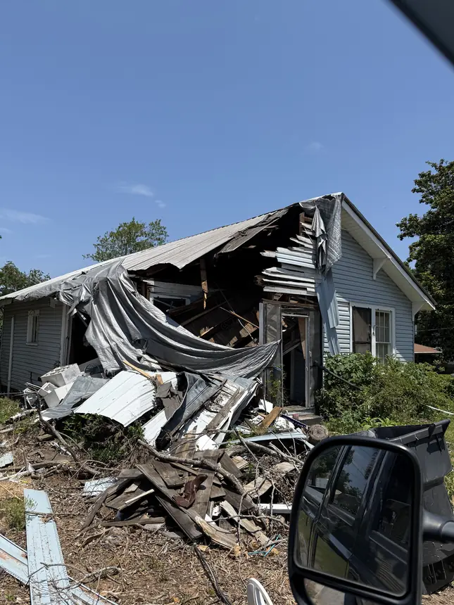 Severely damaged Augusta house with a collapsed roof, bought as-is by Sell My House Fast Augusta